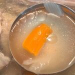 easy chicken bone broth in ladle